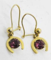 A pair of horseshoe design earrings, hallmarked 9ct gold hangers,