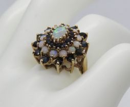 A four tier opal and sapphire cocktail ring,