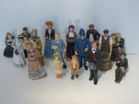 A quantity of ceramic dolls house figurines.