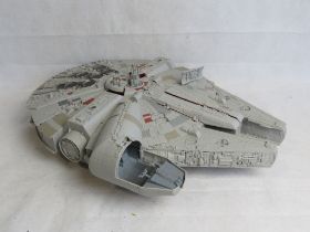 A Star Wars model Millennium Falcon.