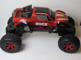 A Pro Series '4 x 4 Offroad Rock Climber' RC vehicle, controller deficient, approx 70cm in length.