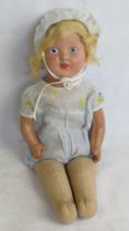 A vintage doll marked to back of neck, B.N.D. London.