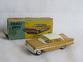 Corgi Toys 248 Chevrolet “Impala” tan body, cream roof/interior, chrome side stripe,