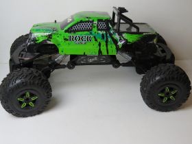 A Pro Series 'Trail 4 x 4 Tested Rock Climber Turbo' remote control vehicle. Controller deficient.