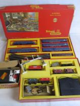 A quantity of Triang model railway including RS.34 and R3 box sets, signal bridge and power unit.
