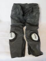 A pair of RST Frank Thomas leather trousers size 34 UK