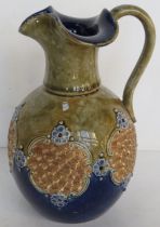 A Royal Doulton Lambeth jug standing approx 19cm high having fluted rim and gilt decorated panels.