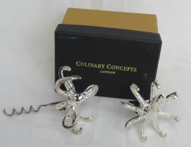 A set of as new in box Culinary Concepts corkscrew and bottle stopper in octopus pattern.