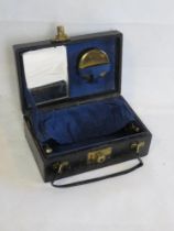 A delightful mid 20th century ladies evening bag with brass accessories.