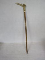 A mid 20th century Whistle walking stick, the antler handle with brass end cap.