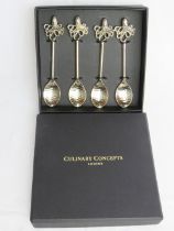 A set of as new in box Culinary Concepts teaspoons in octopus pattern.