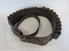 A finely made brown leather double loop cartridge belt.