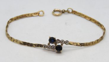 A 9ct gold diamond and sapphire bracelet, 17cm in length, 4.2g.