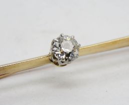 A diamond brooch, approx 0.3ct round cut brilliant solitaire diamond