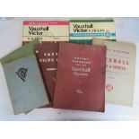 A quantity of Vauxhall handbooks and Pearson's car servicing books.