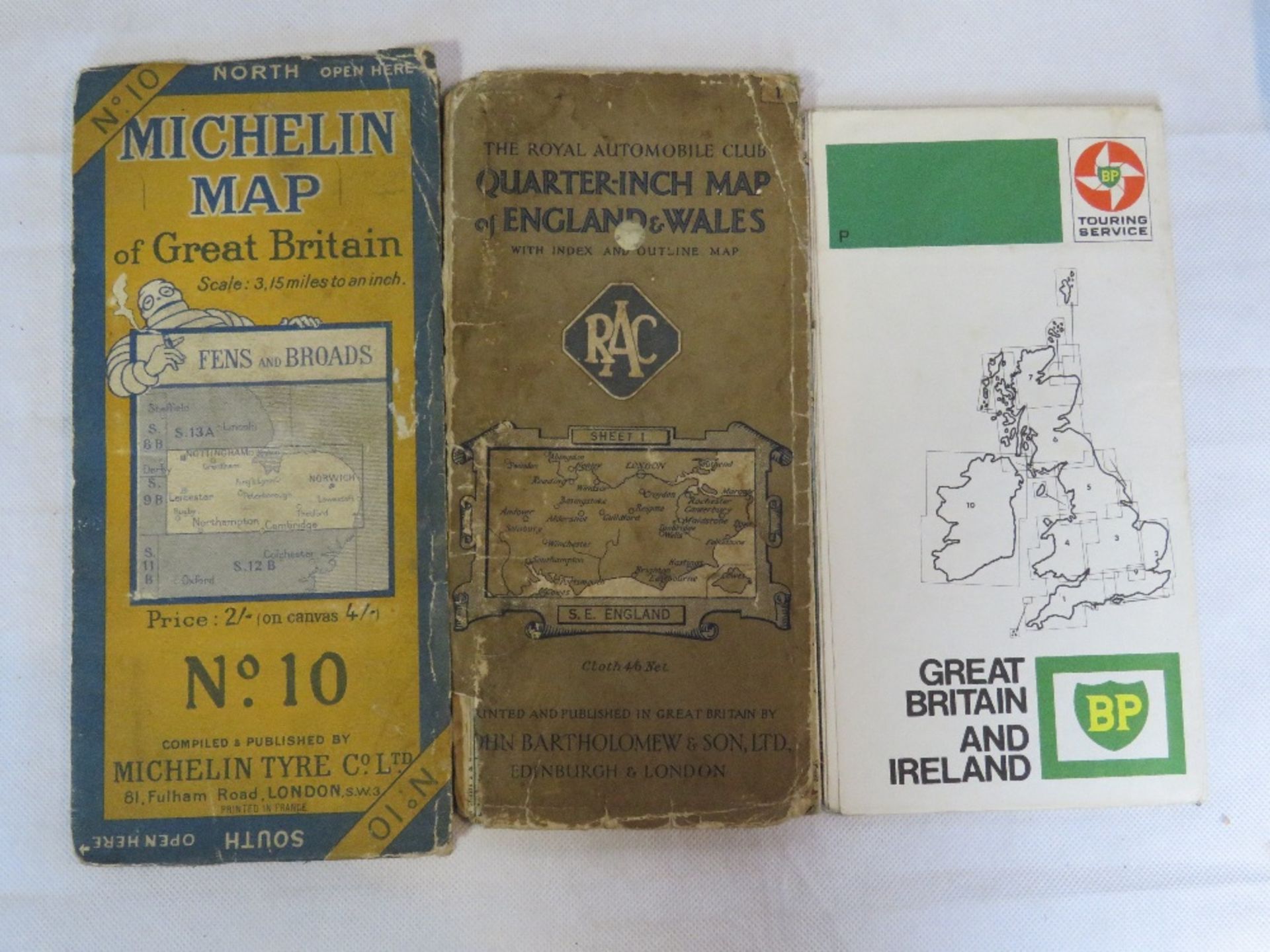 A John Bartholomew & Son Ltd cloth bound RAC quarter-inch map, together with two other road maps.