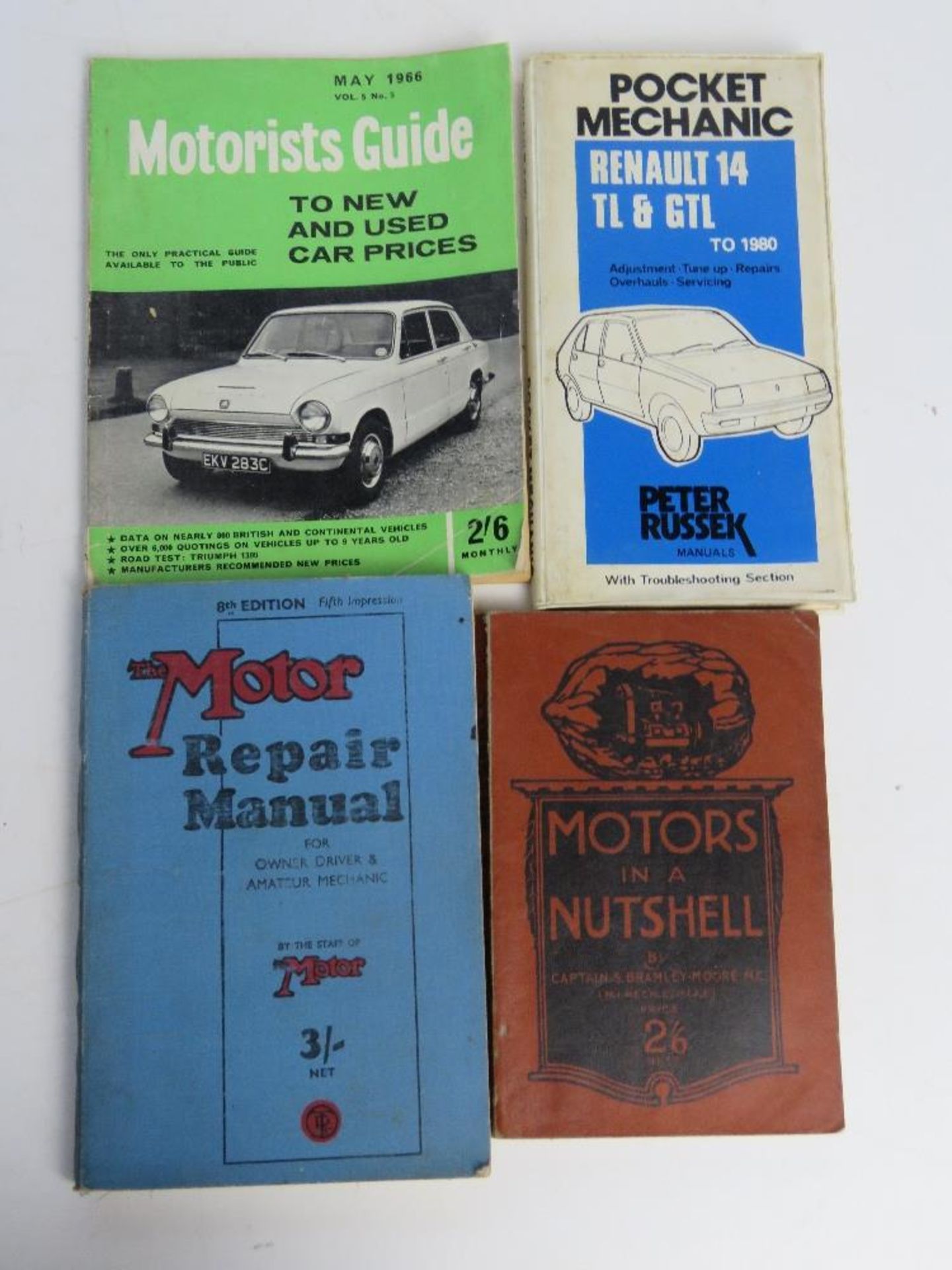 A 1966 Motorists Guide together with Motors in a Nutshell book,