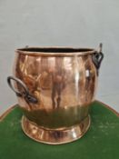 A 19th C. COPPER CAULDRON WITH TWO IRON HANDLES AND A THIRD OVER SWINGING THE CIRCULAR RIM. Dia.