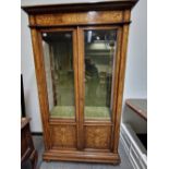 A 19th C. MARQUETRIED WALNUT DISPLAY CABINET, THE BASES OF THE TWO GLAZED DOORS WITH FLORAL