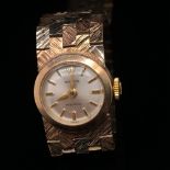 ROLEX. A LADIES 9ct GOLD TRI COLOUR MANUAL WOUND ROLEX BRACELET WATCH THE STRAP HALLMARKED, LONDON,