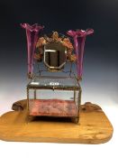 A LATE 19th C. GILT METAL MOUNTED CLEAR GLASS JEWELLERY BOX SURMOUNTED BY A FOLIATE MOUNTED MIRROR