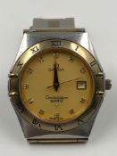 AN OMEGA CONSTELLATION QUARTZ GENTLEMAN'S WRIST WATCH. THE CHAMPAGNE DIAL WITH DIAMOND INDEXES, A