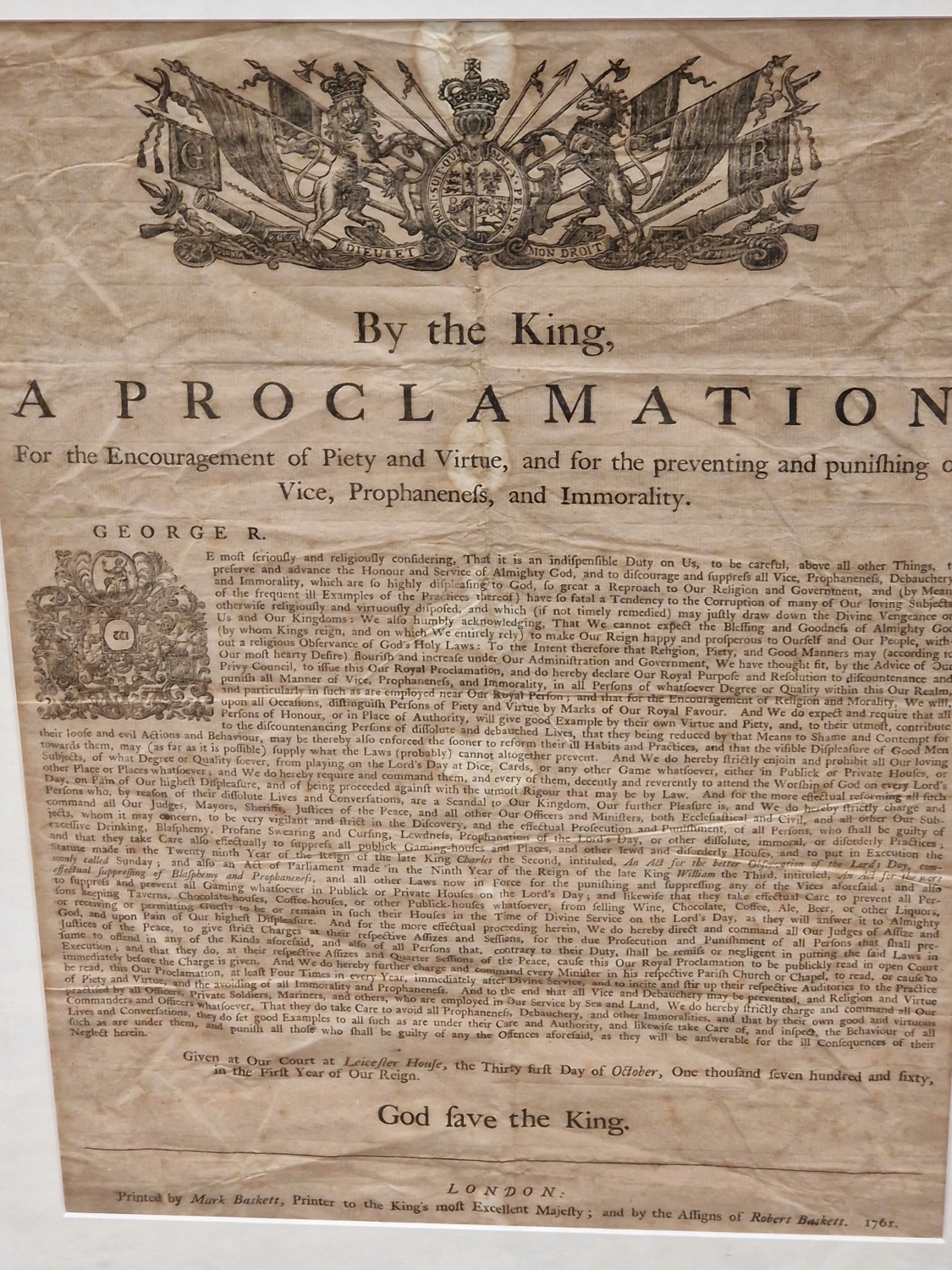 A FRAMED 1761 PROCLAMATION BY GEORGE III FOR THE ENCOURAGEMENT OF PIETY AND VIRTUE. 45.5 x 33cms.