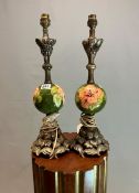 A PAIR OF MOORCROFT TABLE LAMPS WITH FLORAL MOUNTS, THE SPHERICAL POTTERY PARTS SLIP TRAILED WITH
