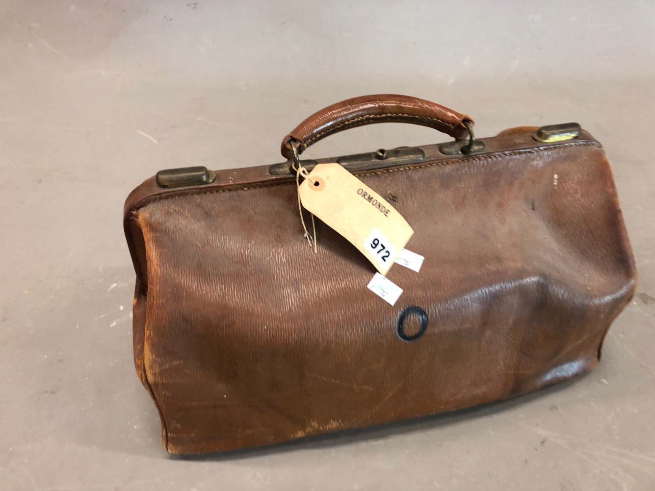 A PEAL & CO LEATHER GLADSTONE BAG, A LEATHER SUITCASE, THE LID. 43 x 35cms. TOGETHER WITH A BLACK