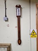 A CONTEMPORARY MAHOGANY STICK BAROMETER BY PETER WIGGINS, A BROKEN PEDIMENT ABOVE THE SILVERED DIAL,