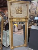 A RECTANGULAR MIRROR IN AN EARLY 19th C. PARCEL GILT GREY GROUND FRAME, THE PANEL ABOVE THE GILT