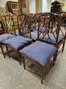 A SET OF EIGHT MAHOGANY SIMULATED BAMBOO CHAIRS INCLUDING TWO WITH ARMS, THE COCK PEN STYLE OPEN