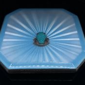 A HALLMARKED SILVER AND GUILLOCHE ENAMEL POWDER COMPACT. THE FRONT WITH MARCASITE AND HARDSTONE