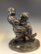 IZUMI SEIJO (1865-1937), A BRONZE OF TWO YOUNG BOYS WRESTLING, SEIJO SEAL MARK ON THE BASE. H
