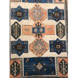 A TURKISH CARPET OF CAUCASIAN DESIGN 304 x 217cms