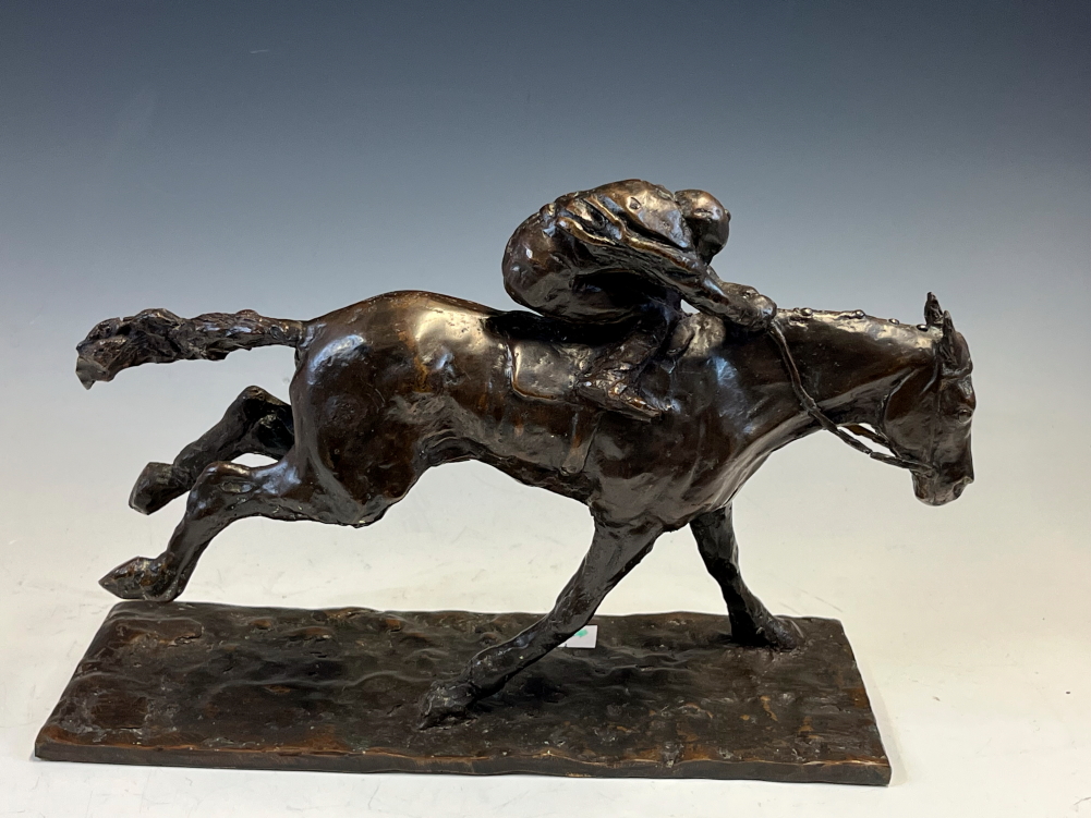 A 20th C. BRONZE HORSE WITH THE JOCKEY CROUCHED OVER ITS NECK, THE RECTANGULAR BASE. W 31.5cms. - Image 10 of 10