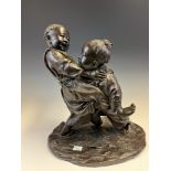 IZUMI SEIJO (1865-1937), A BRONZE OF TWO YOUNG BOYS WRESTLING, SEIJO SEAL MARK ON THE BASE. H