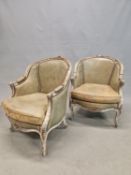 A PAIR OF FRENCH GREY PAINTED HOOP BACK FAUTEUILS, THE GREY LEATHERETTE UPHOLSTERED BACKS CRESTED B