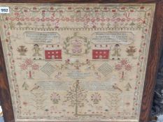 ELIZABETH BROWNS 1830 SAMPLER WORKED WITH VERSES, HOUSES, FIGURES, PLANTS AND ANIMALS WITHIN A