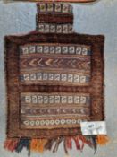 A TRIBAL MIXED TECHNIQUE BAG TOGETHER WITH A FLAT WEAVE PANEL AND TWO AFGHAN MATS (4)