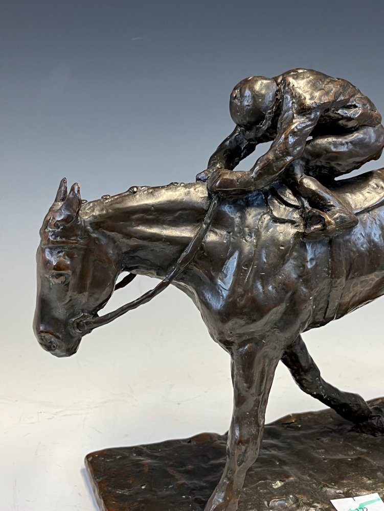 A 20th C. BRONZE HORSE WITH THE JOCKEY CROUCHED OVER ITS NECK, THE RECTANGULAR BASE. W 31.5cms. - Image 3 of 10