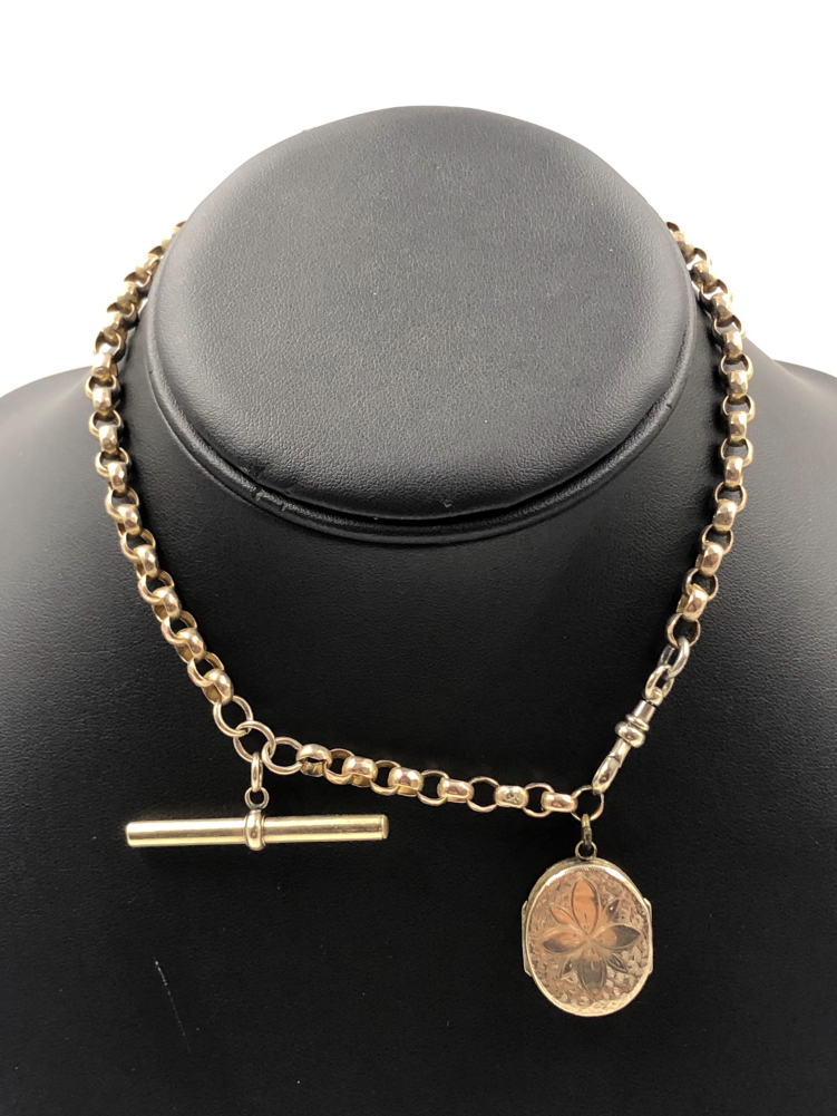 A VINTAGE DIAMOND CUT BELCHER CHAIN COMPLETE WITH T-BAR AND FOUR PANEL LOCKET. ALL UNMARKED,