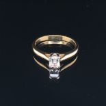 AN 18ct HALLMARKED GOLD MILLENNIUM CUT DIAMOND RING. STATED DIAMOND WEIGHT TO SHANK 0.35cts.