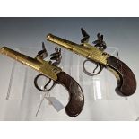 A RARE PAIR OF 18th CENTURY FLINTLOCK POCKET PISTOLS WITH BRASS TURN OFF BARRELS THE LOCKS SIGNED I.