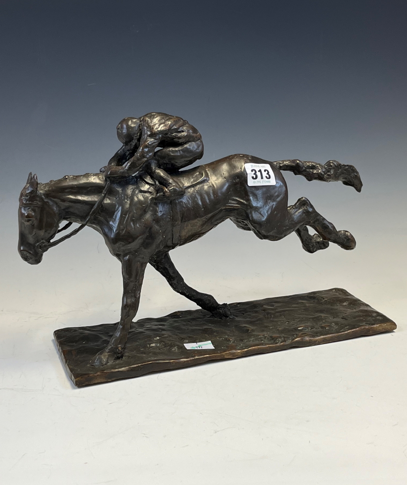 A 20th C. BRONZE HORSE WITH THE JOCKEY CROUCHED OVER ITS NECK, THE RECTANGULAR BASE. W 31.5cms. - Image 2 of 10