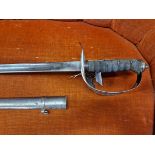 A GEORGE V TODHOUSE OFFICERS SWORD IN AN IRON SCABBARD, THE SHAGREEN HANDLE WITH PIERCED METAL