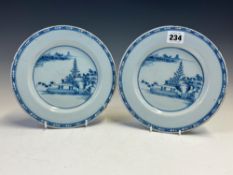 A PAIR OF 18th C. ENGLISH DELFT BLUE AND WHITE PLATES PAINTED WITH CHINOISERIE ISLAND SCENES. Dia.