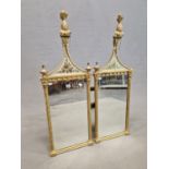 A PAIR OF 19th C. MIRRORS, THE RECTANGULAR PLATES BETWEEN GILT FLUTED COLUMNS AND BELOW TRIANGULAR