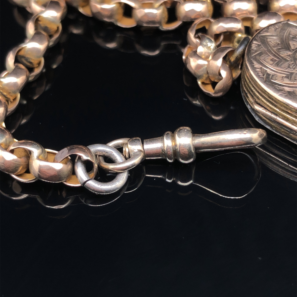 A VINTAGE DIAMOND CUT BELCHER CHAIN COMPLETE WITH T-BAR AND FOUR PANEL LOCKET. ALL UNMARKED, - Image 4 of 6