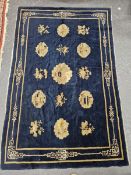 AN ANTIQUE CHINESE RUG 202 X 128 CM